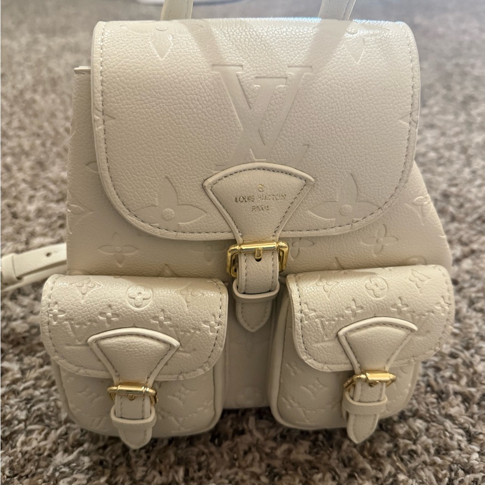 Super Bag, brand new never worn, sale is final, asking price $350.00